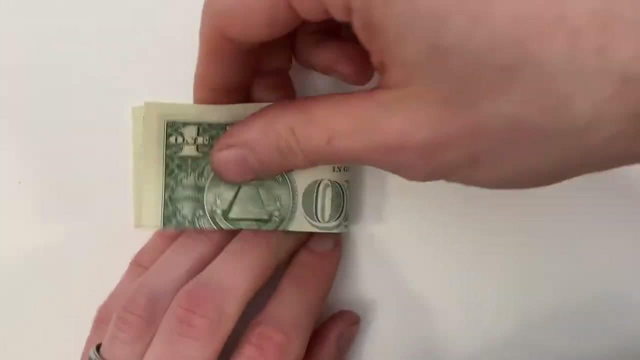 Step 3: Crease the Folded Bill in Half, Then Unfold - How to Fold Money Into a Heart