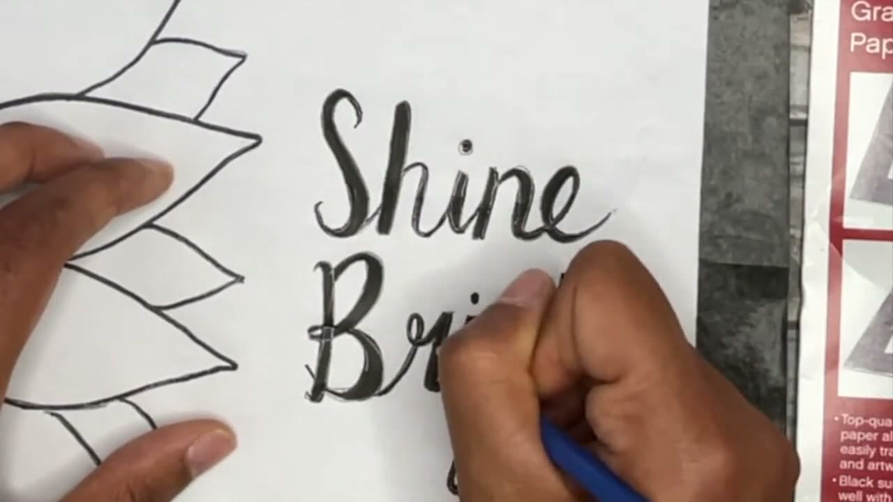 Step 4: Trace the Shine Bright Lettering on the Printout - How to Transfer a Sketch to Canvas (2 Easy Ways)