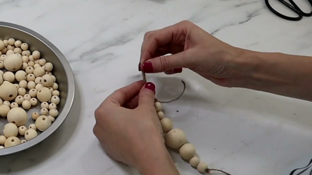 Step 5: String a Drop Ornament on Jute - How to Make Christmas Ornaments