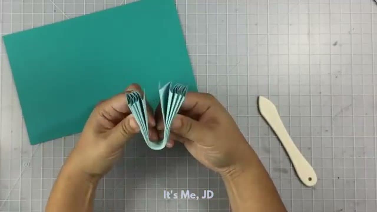 Step 3: Step 3: Fold the Accordion in Half