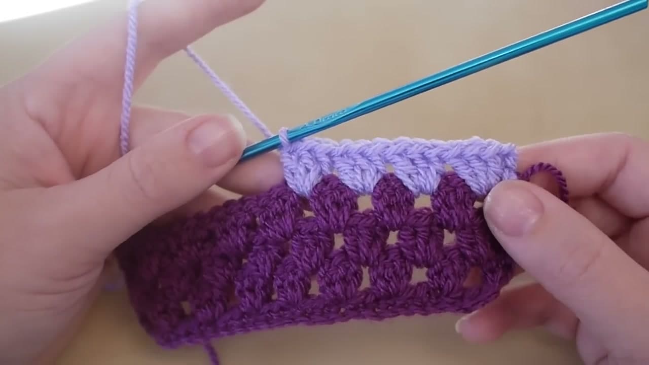 The finished result: How to Crochet a Granny Stripe Pillow Cover (Beginner-Friendly)