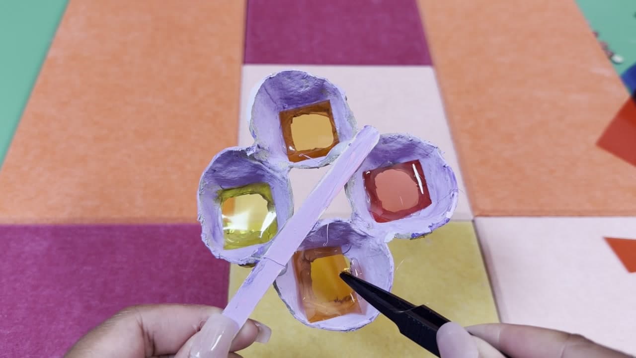 Step 7: Fill the Egg Carton Windows With Colored Acetate - How to Make an Egg Carton Butterfly Suncatcher