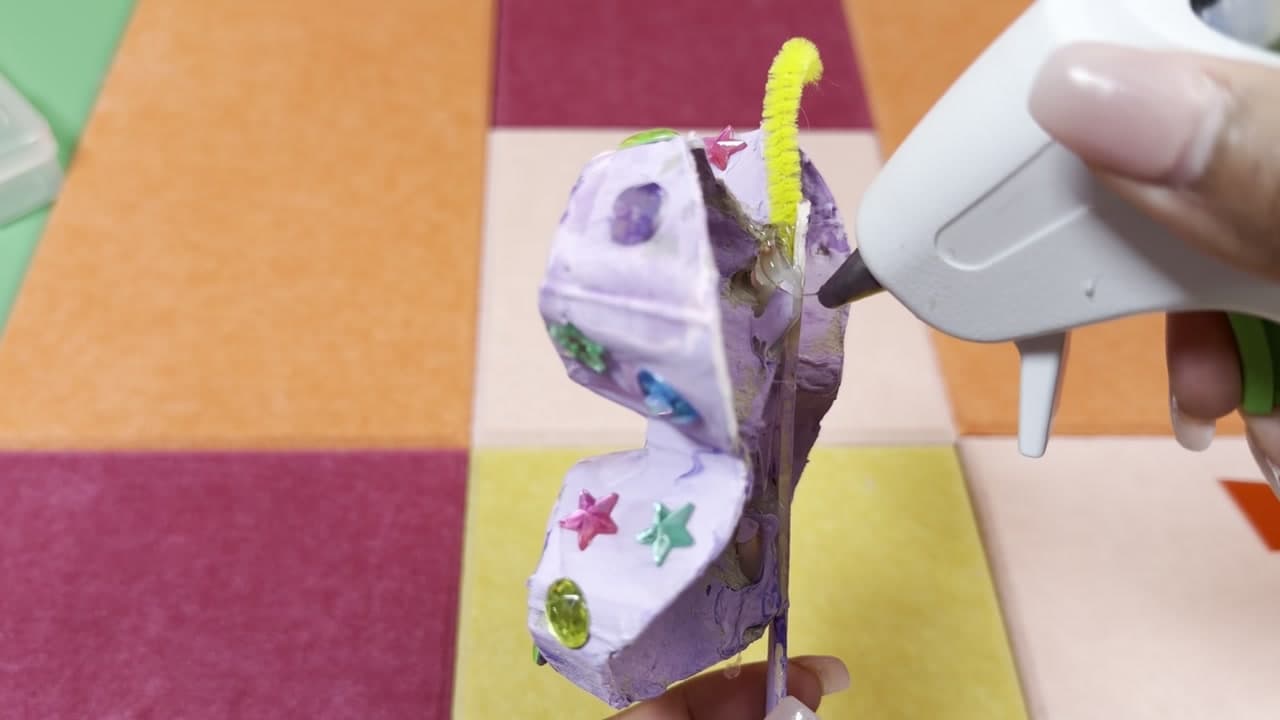 Step 8: Add Pipe Cleaner Antennae to the Egg Carton Butterfly - How to Make an Egg Carton Butterfly Suncatcher