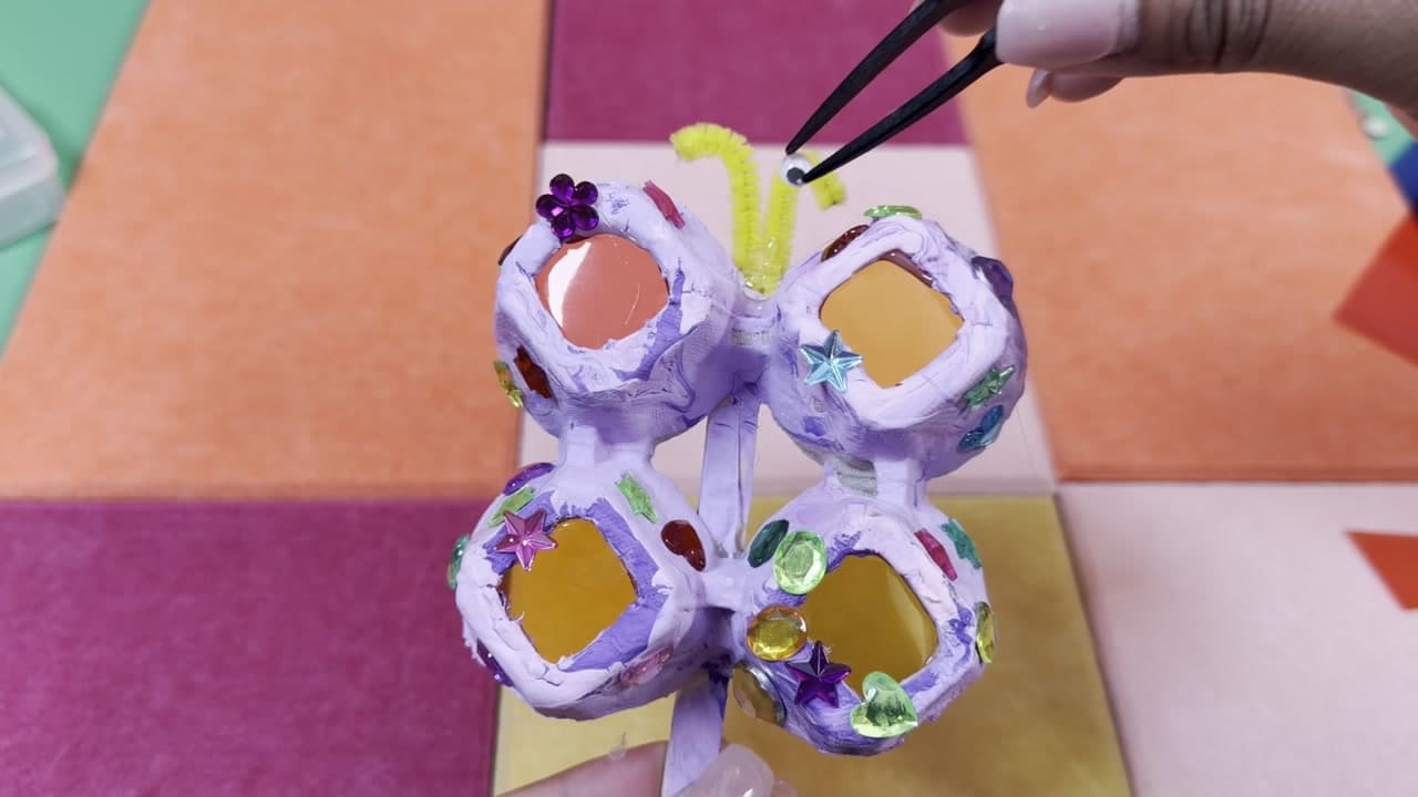 The finished result: How to Make an Egg Carton Butterfly Suncatcher