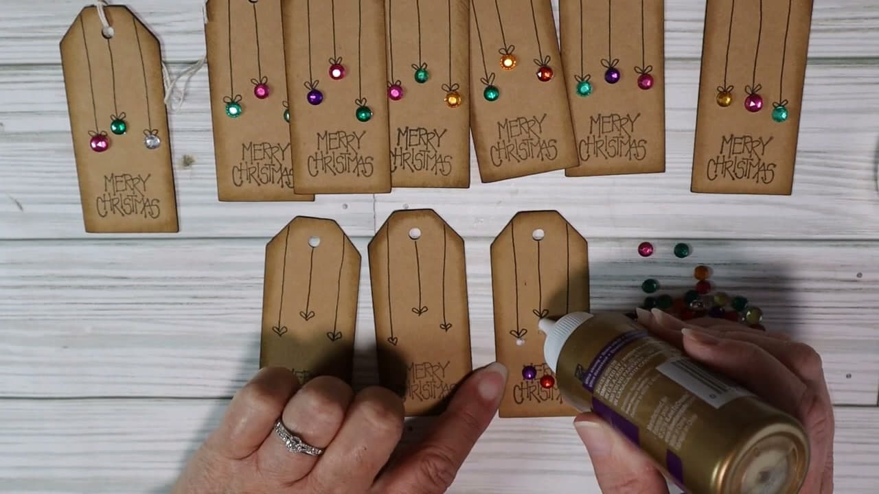 Step 7: Glue the Gems On - How to Make Christmas Gift Tags