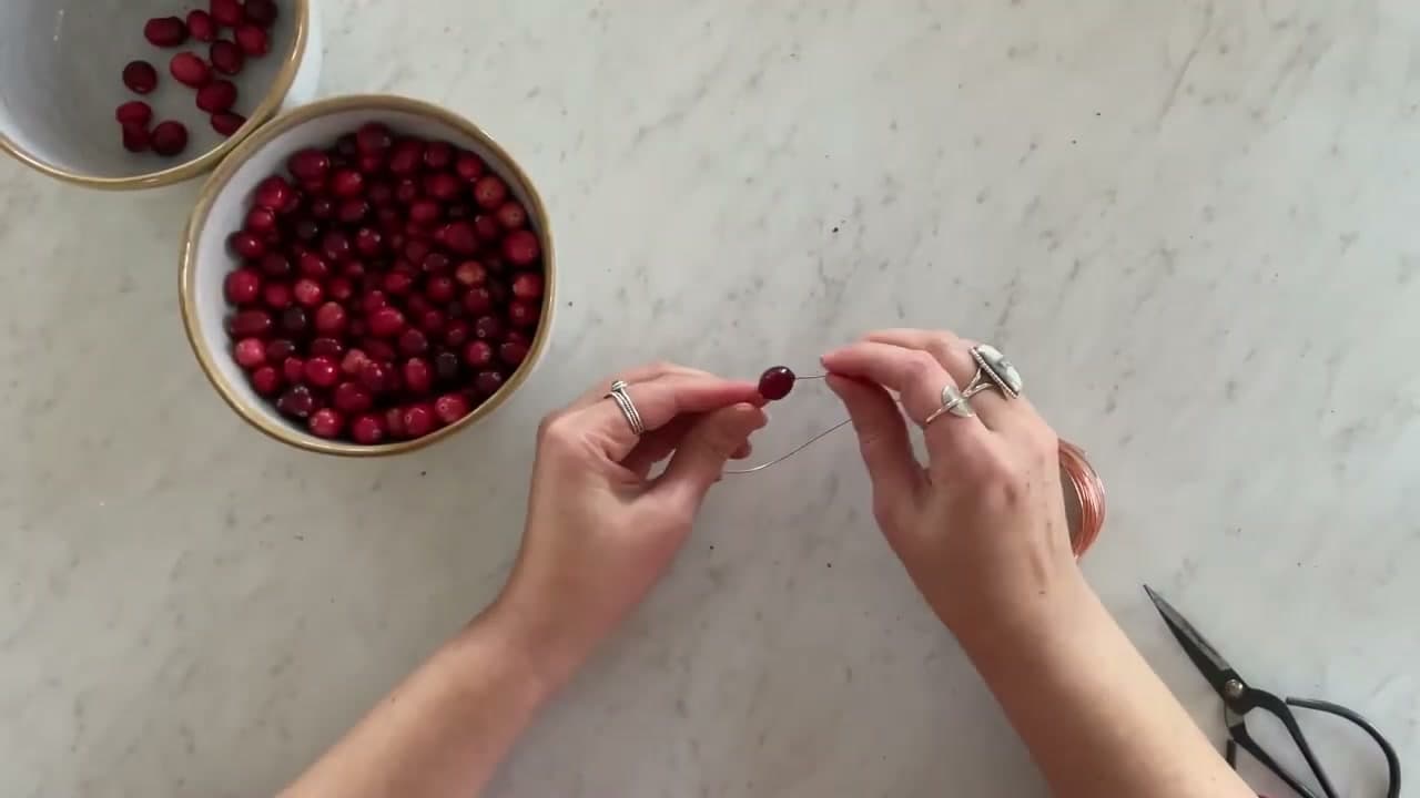 Step 5: String Cranberries on 20-Gauge Floral Wire Without a Needle - How to Make a Christmas Garland
