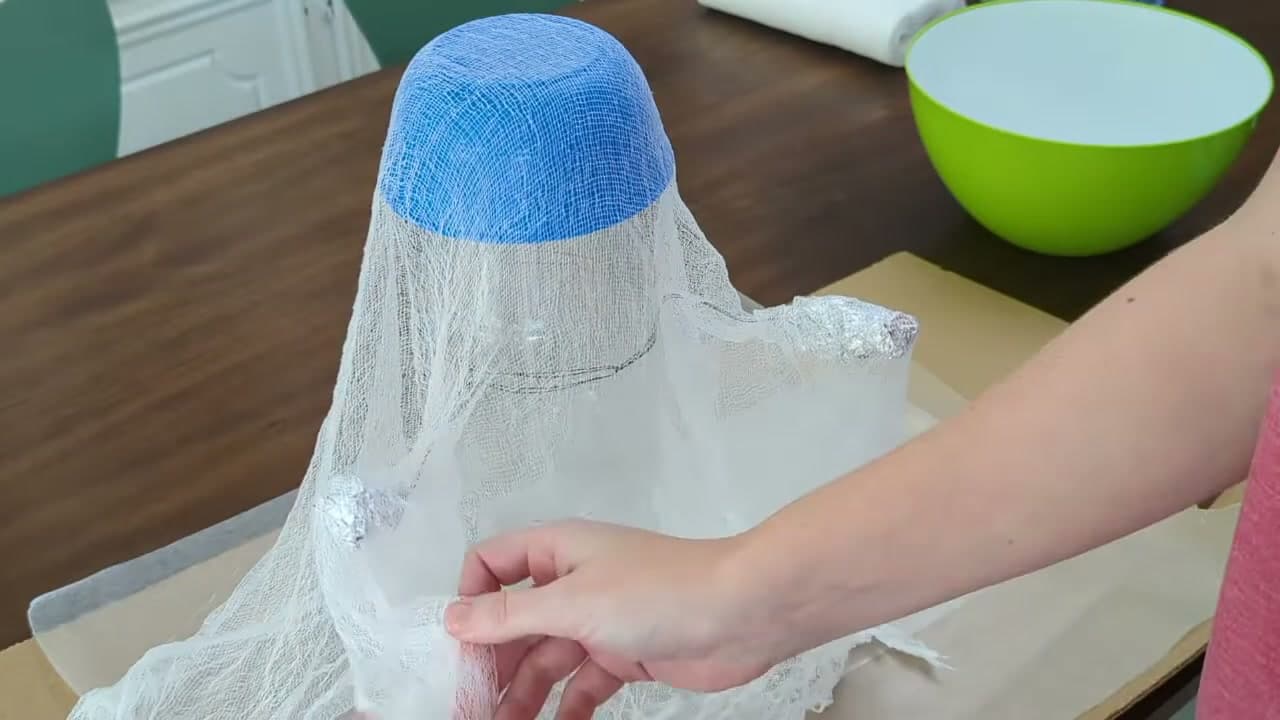 Step 6: Drape, Shape, and Clump the Folds - How to Make a No-Sew Cheesecloth Ghost (Floating Halloween Decor)