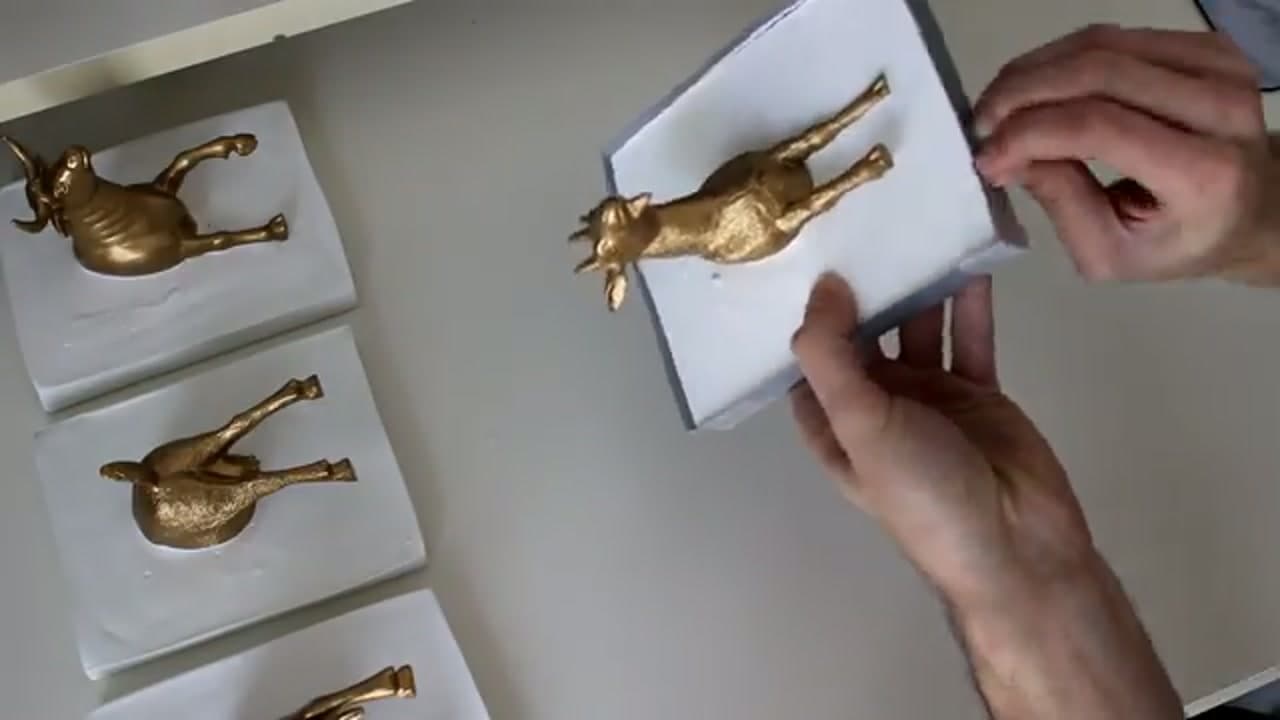 Step 6: Demold and Sand the Edges - How to Make Concrete Bookends with Gold Animals