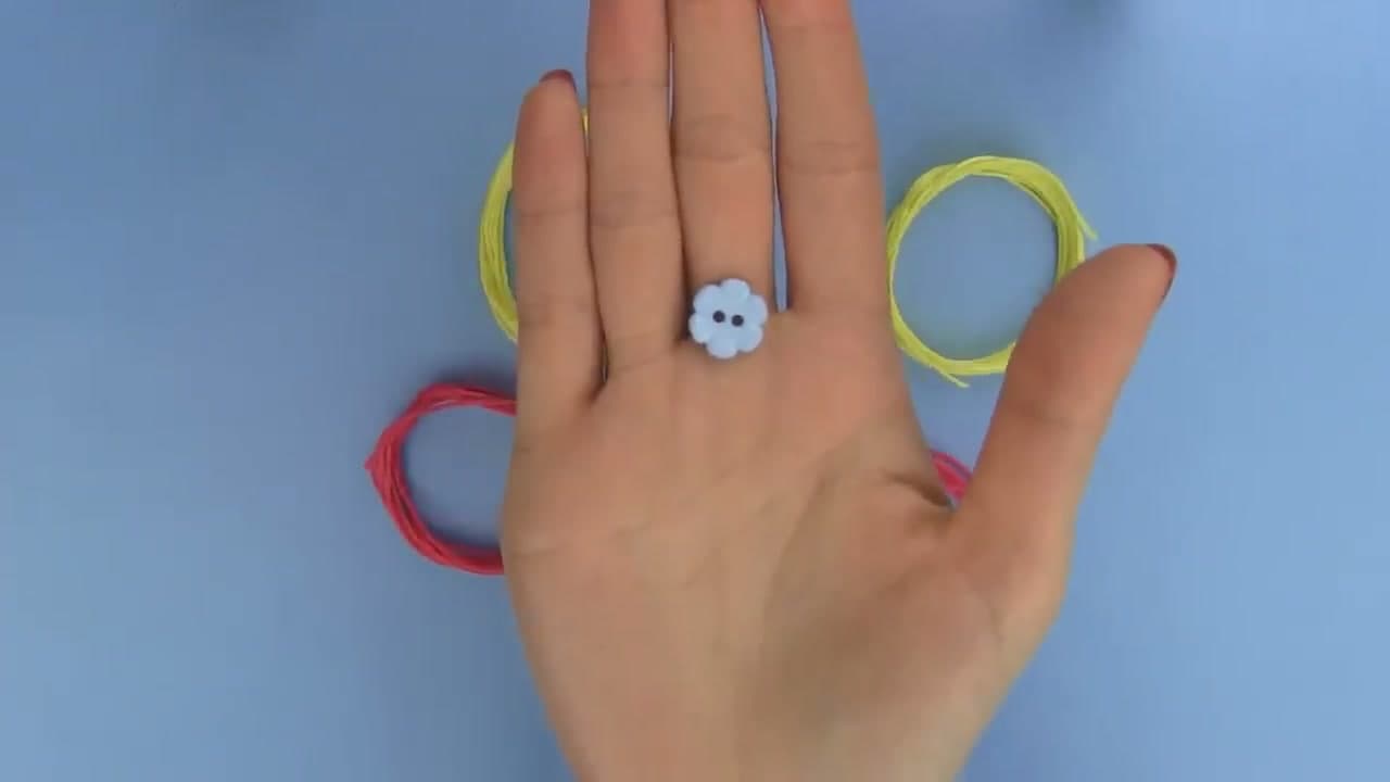 Step 2: Cut and Fold Your Floss - How to Make a Heart Friendship Bracelet