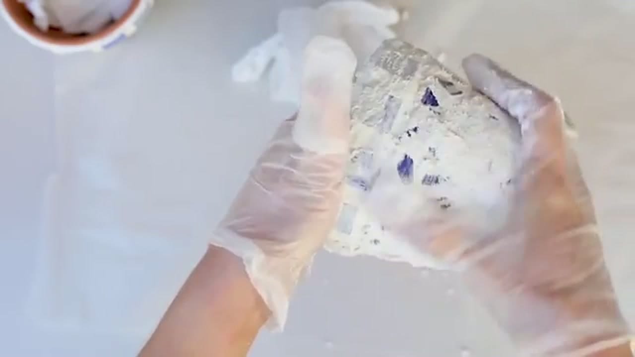 Step 6: Spread Grout Over the Tiles - How to Make a Mosaic Flower Pot