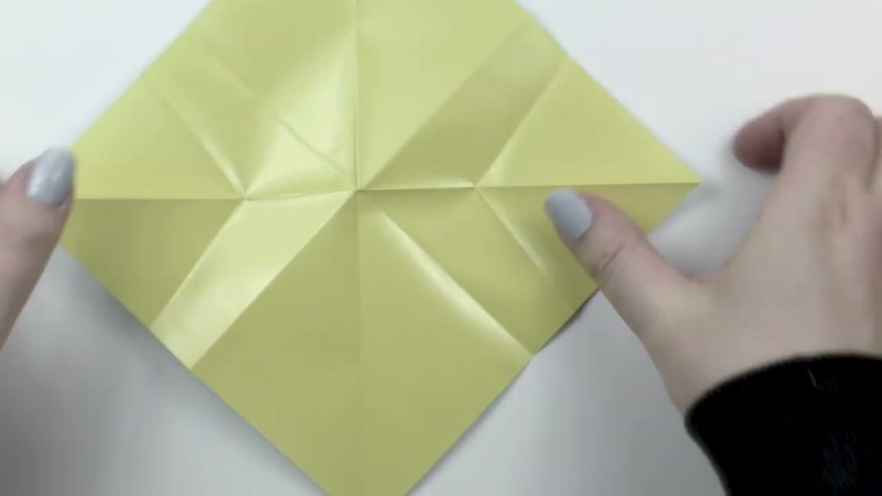 Step 3: Fold the First Two Points Up to the Top