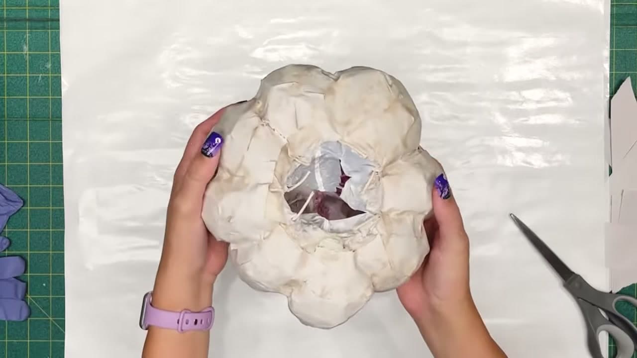 Step 7: Pull the Stuffing Out - How to Make Paper Mache Pumpkins