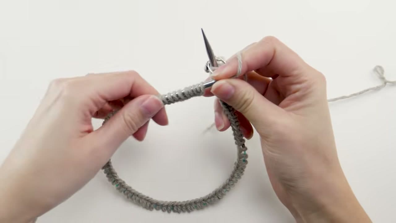 Step 3: Lay the Cast-On Round Flat and Add a Stitch Marker - How to Knit a Hat