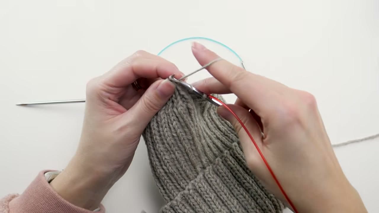 Step 7: Knit the Stitches Onto a Longer Circular Needle - How to Knit a Hat