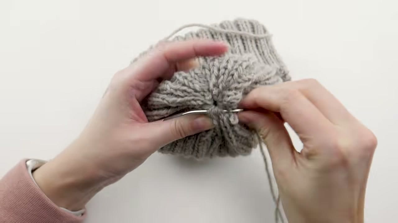 Step 8: Thread the Tail Through the Last Stitches and Cinch the Crown - How to Knit a Hat