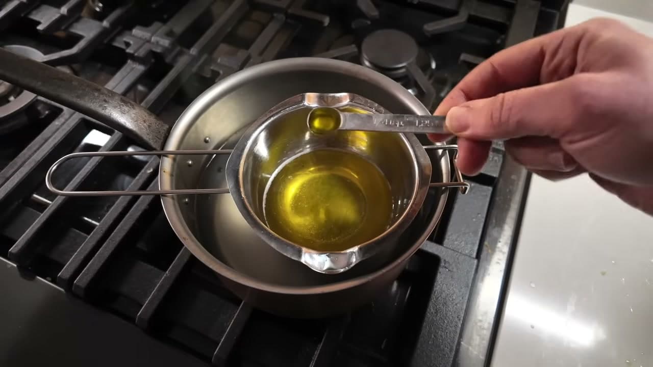 Step 5: Stir In the Olive Oil and Essential Oil Off the Heat - How to Make Lip Balm