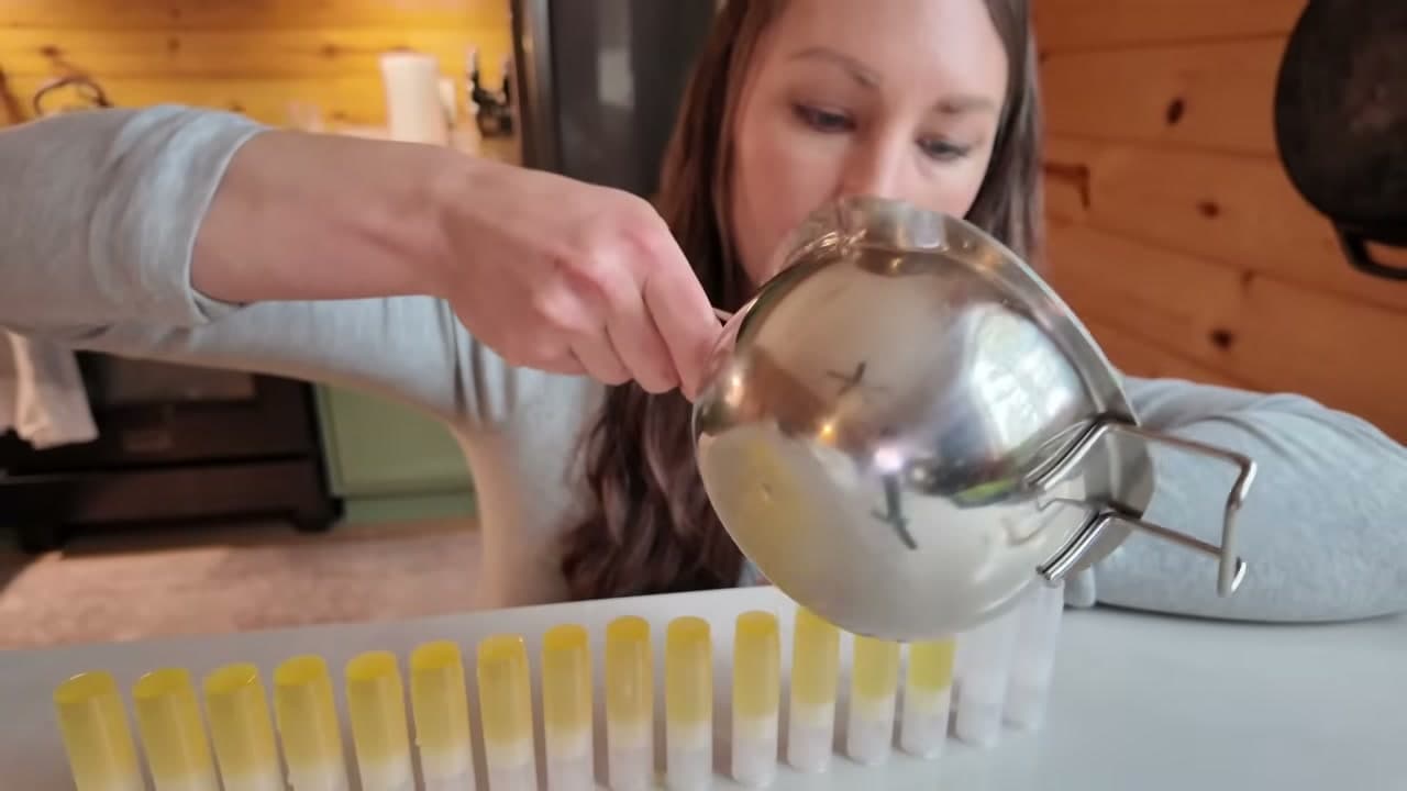 Step 7: Pour the Hot Balm Down the Row of Tubes - How to Make Lip Balm