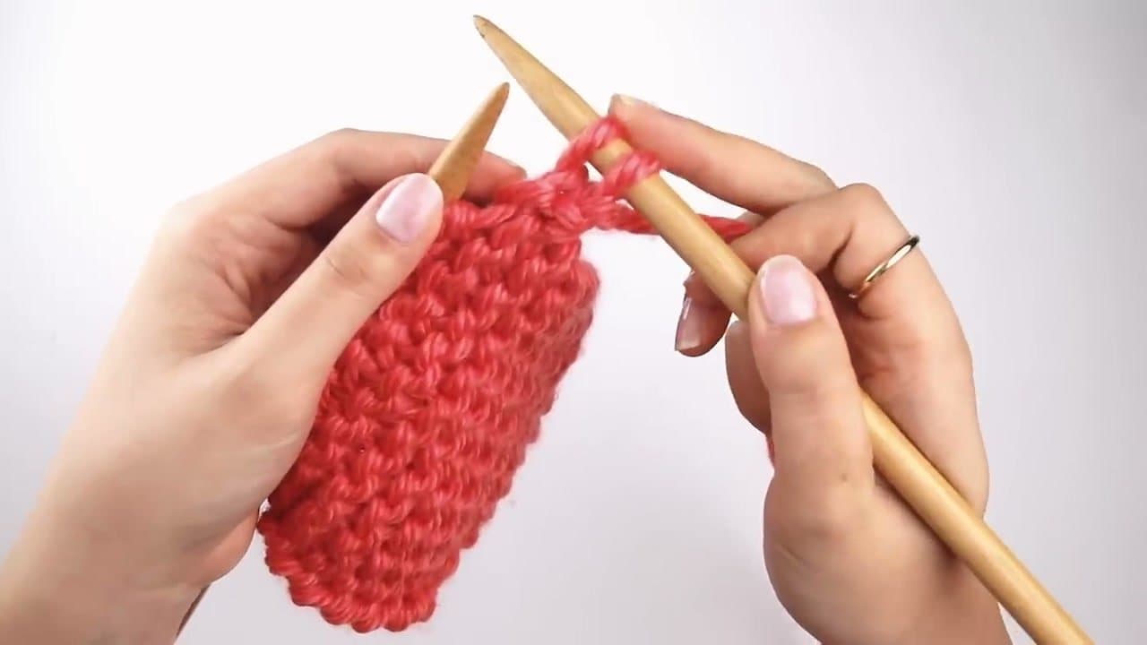 Step 2: Step 2: Lift the First Stitch Over the Second
