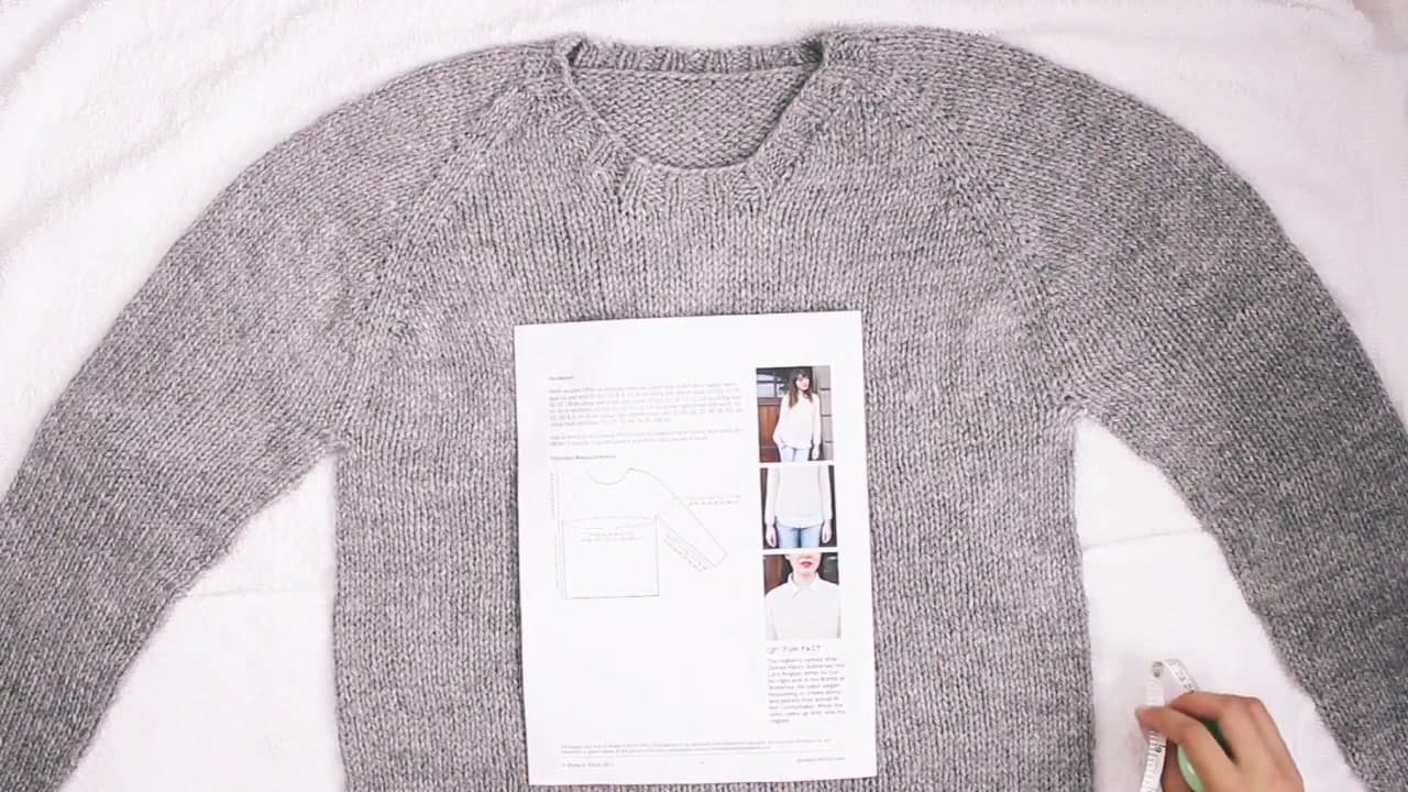 Step 3: Lay the Damp Sweater Flat on Towels Beside the Pattern Schematic - How to Block Knitting