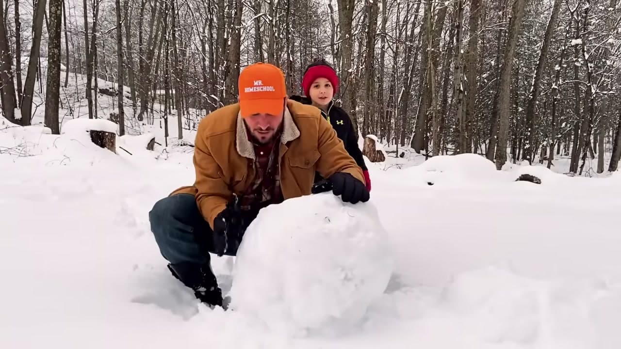 Step 1: Roll the Snowman's Base Ball Across Fresh Snow - How to Make a Snowman