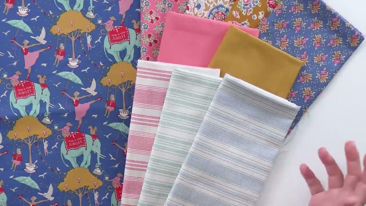 Step 4: Add Tilda Basics for Print Variety Without Chaos - How to Choose Quilting Fabric (A Quilter's Fabric Pull Walkthrough)