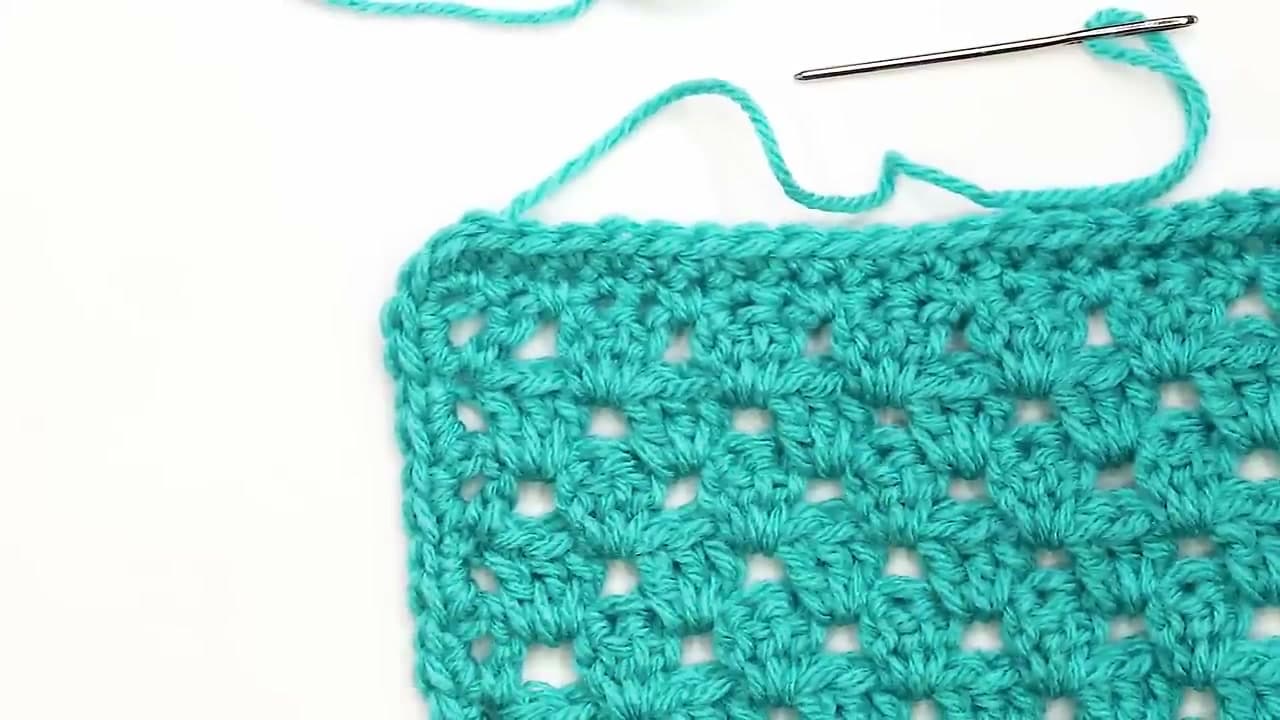 The finished result: How to Crochet a Granny Stripe Blanket (Beginner)