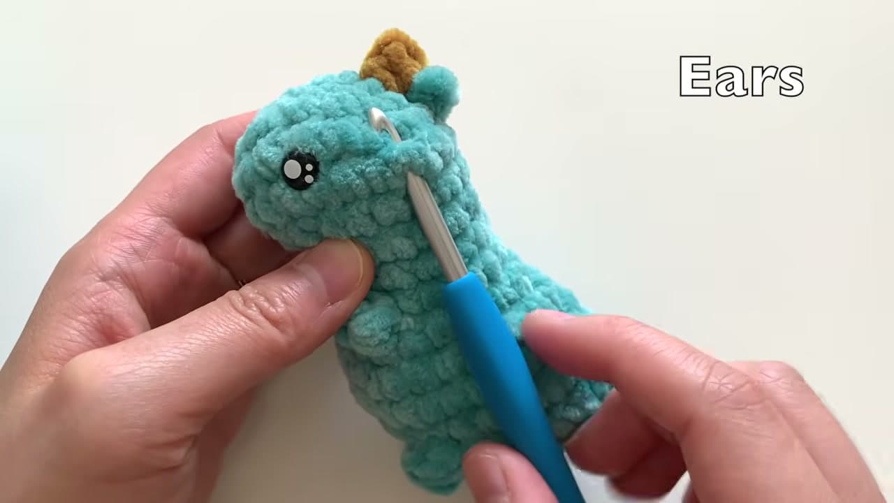 Step 2: Attach the First Ear - How to Crochet a Dragon (Pocket Dragon Amigurumi, Step by Step)