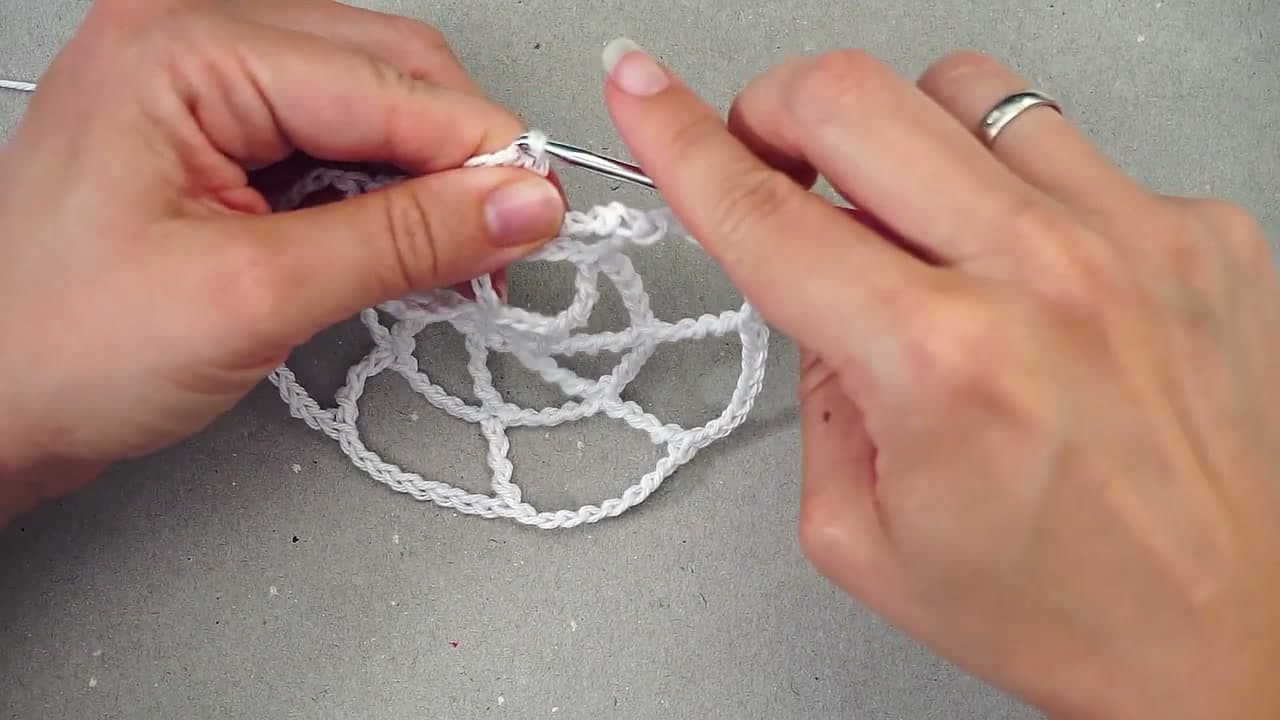 Step 5: Grow the web with bigger arcs each round - How to Crochet a Spider Web (Halloween Decor)