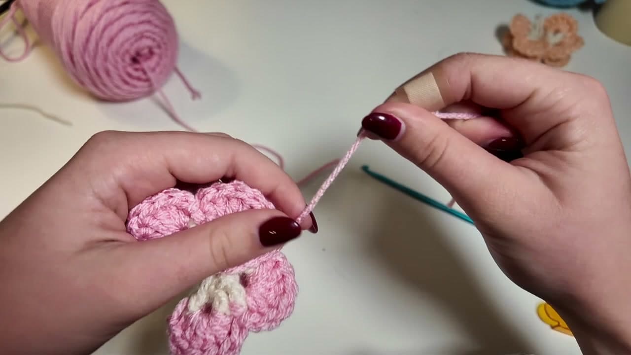 Step 6: Step 6: Fold and Cinch the Butterfly Body