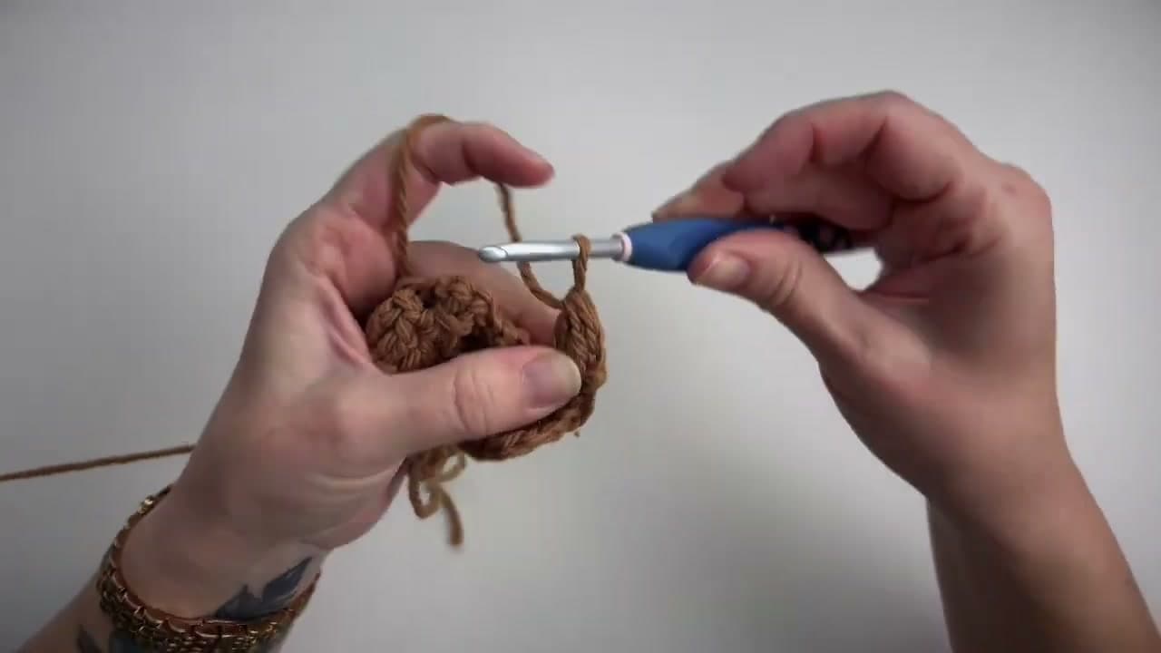 Step 5: Row 3 - decrease at both edges