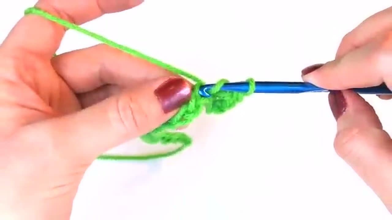 Step 4: Step 4: Insert hook, yarn over, pull through (3 loops on hook)
