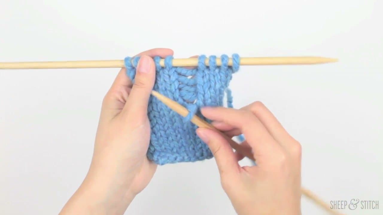 Step 4: Pull the Stitch Over the Rung - How to Fix a Dropped Knitting Stitch: 7 Step Rescue Tutorial