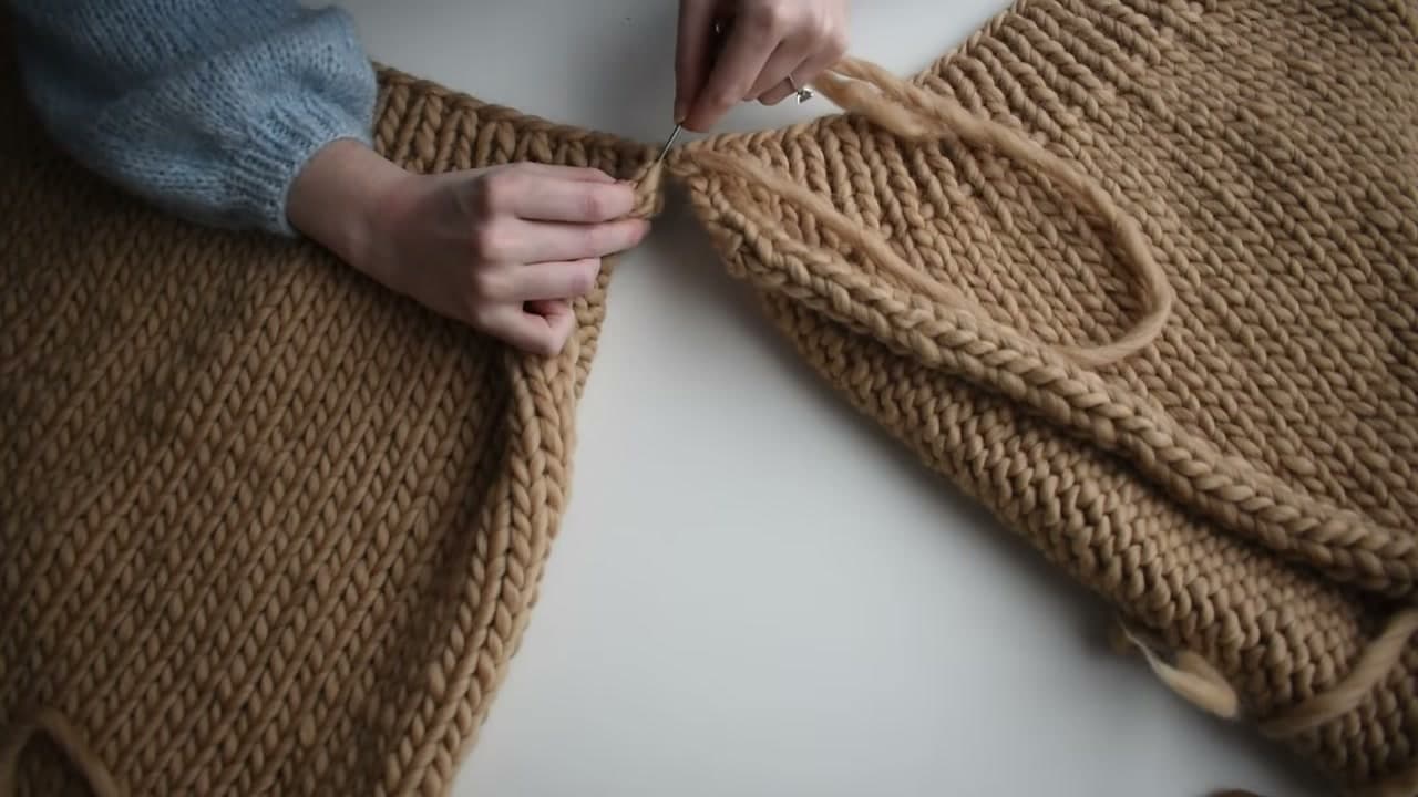 Step 8: Seam the Sweater Sides With Mattress Stitch - How to Knit a Chunky Sweater for Beginners