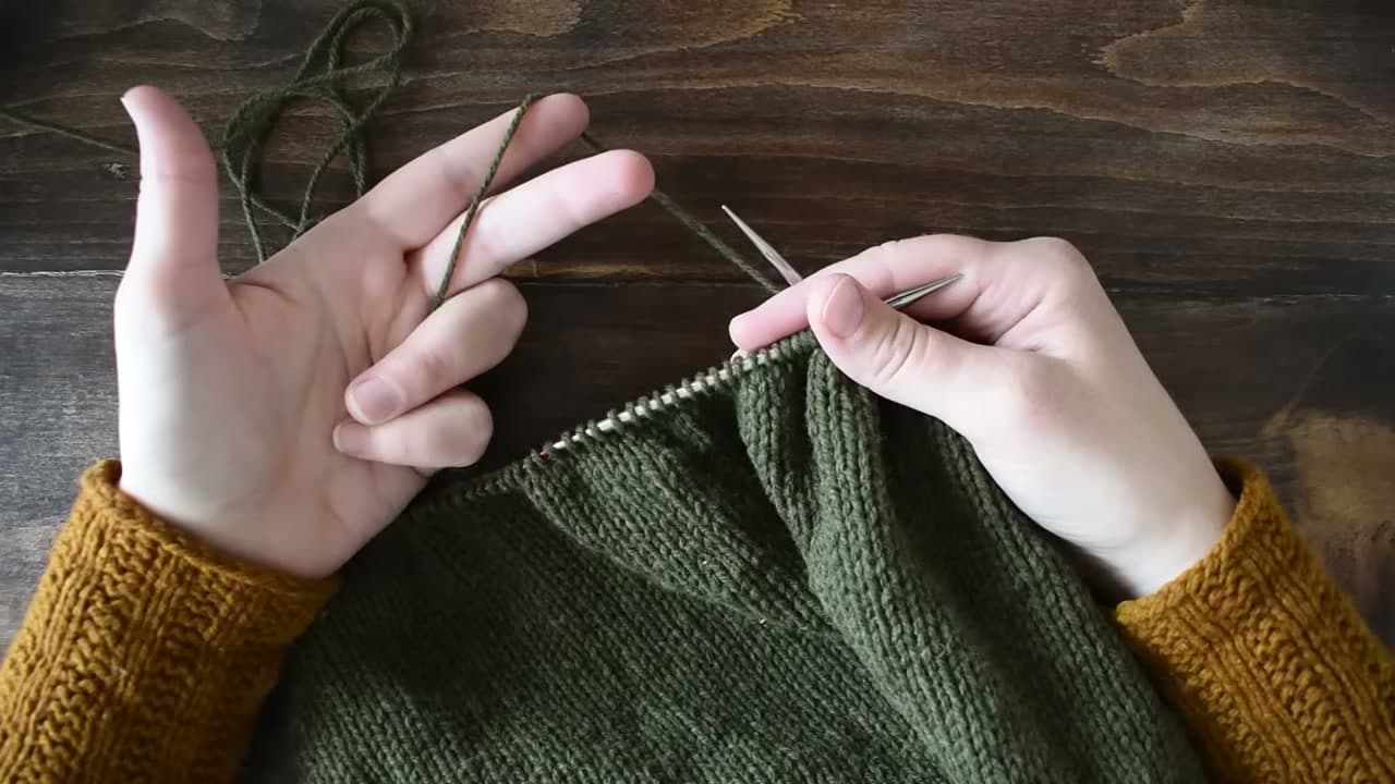 Step 1: Run the Yarn Through Your Left Fingers - How to Knit Continental Style for Faster, Smoother Knitting