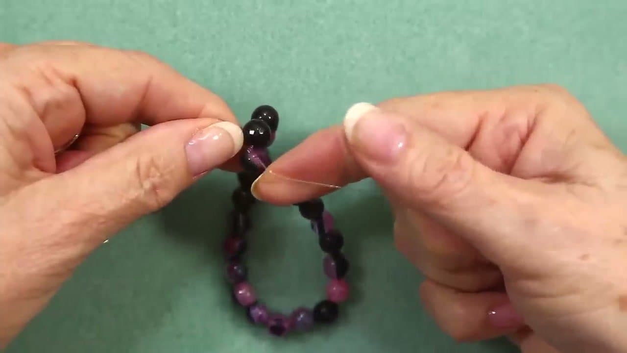 Step 7: Step 7: Tie five overhand knots that travel