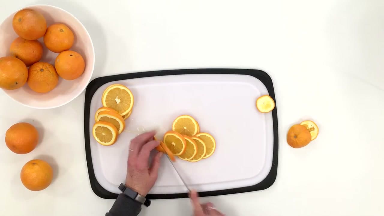 Step 1: Slice the Oranges a Quarter Inch Thick - How to Dry Orange Slices