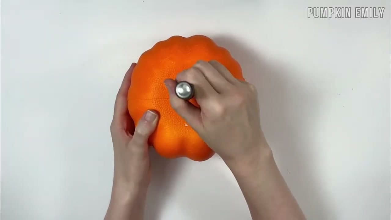 Step 2: Cut Holes in the Top and Bottom of the Foam Pumpkin - How to Make a No-Crochet Yarn Pumpkin (2 Easy Methods)
