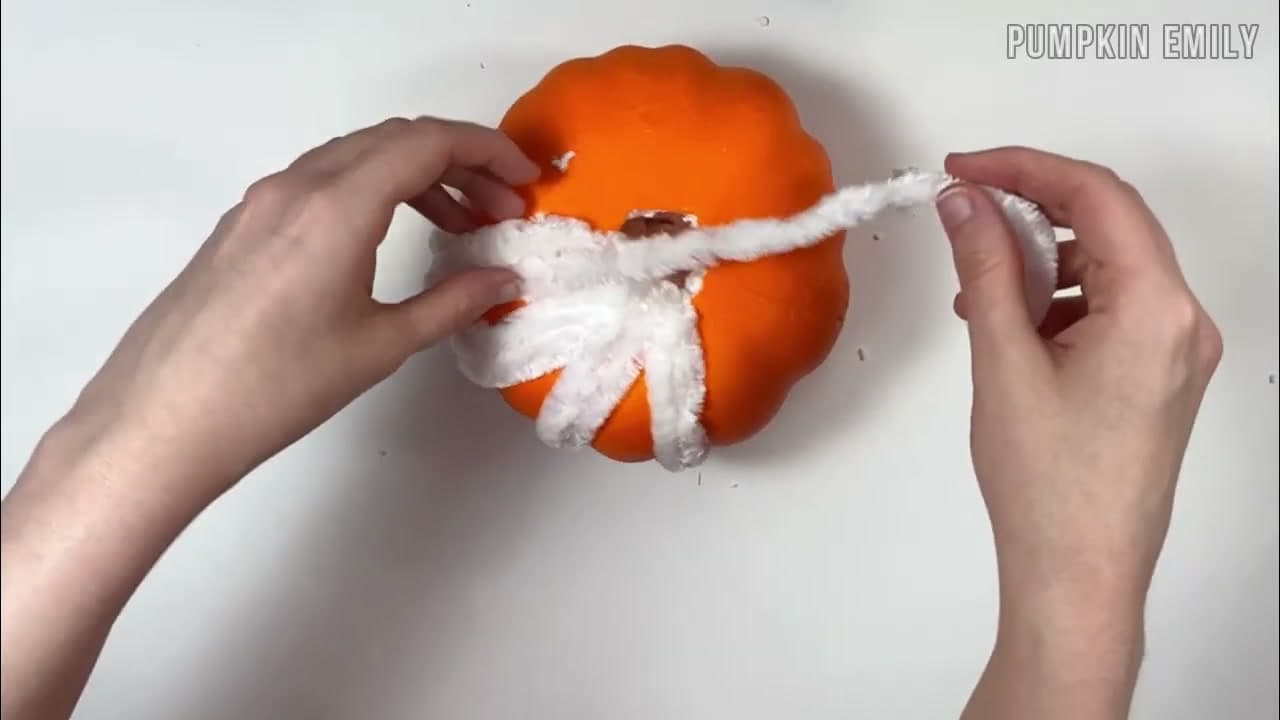 Step 3: Wrap Chunky Yarn Through the Pumpkin - How to Make a No-Crochet Yarn Pumpkin (2 Easy Methods)