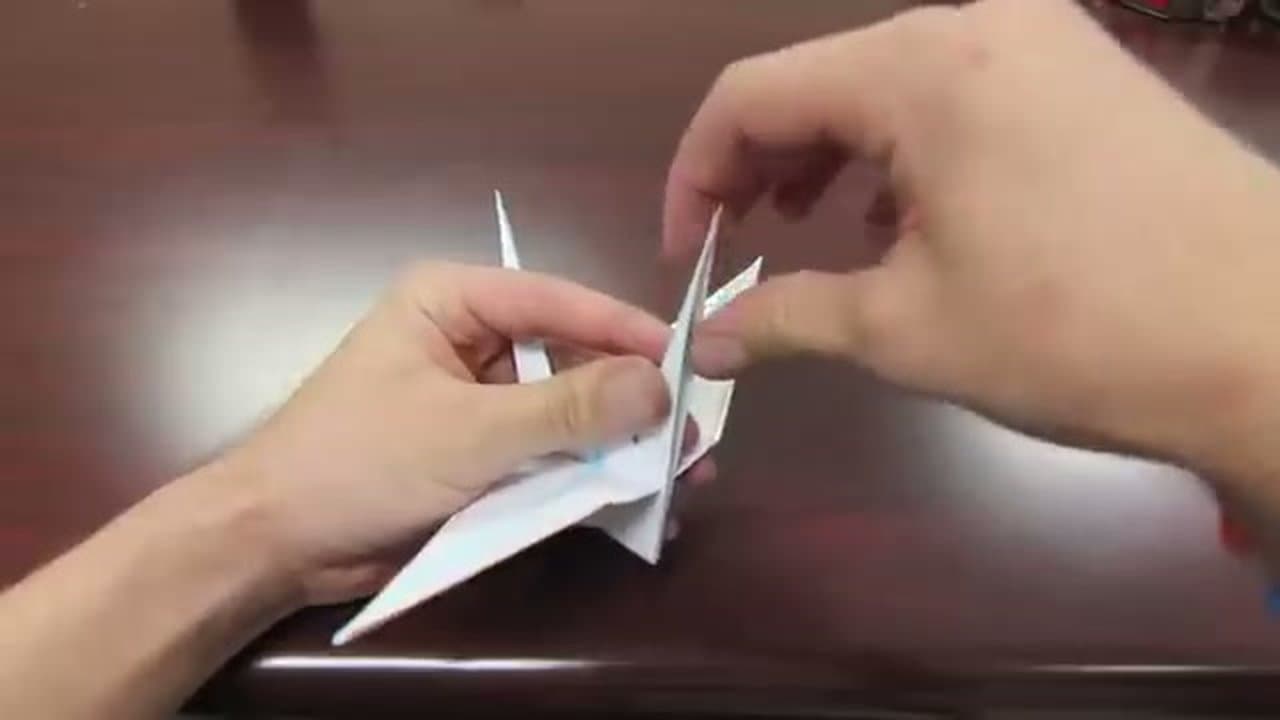 Step 8: Step 8: Form the Head and Open the Wings