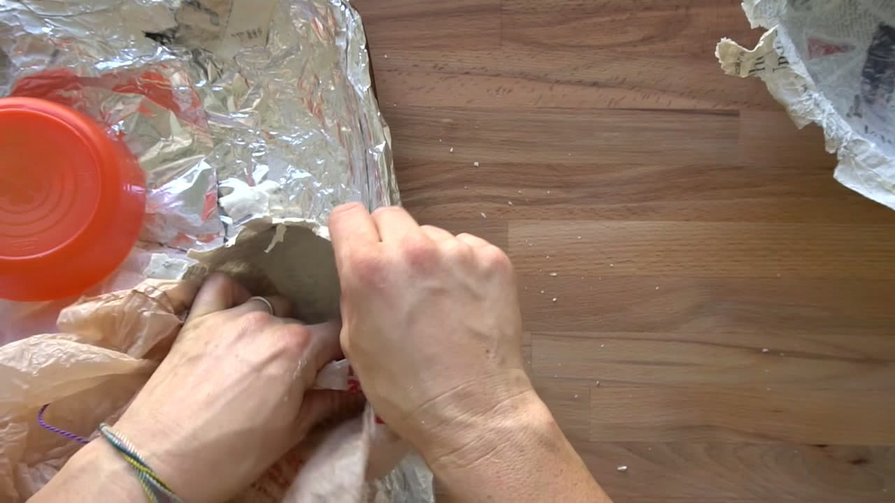 Step 7: Lift Out the Form, Then Peel the Plastic - How to Make Paper Mache
