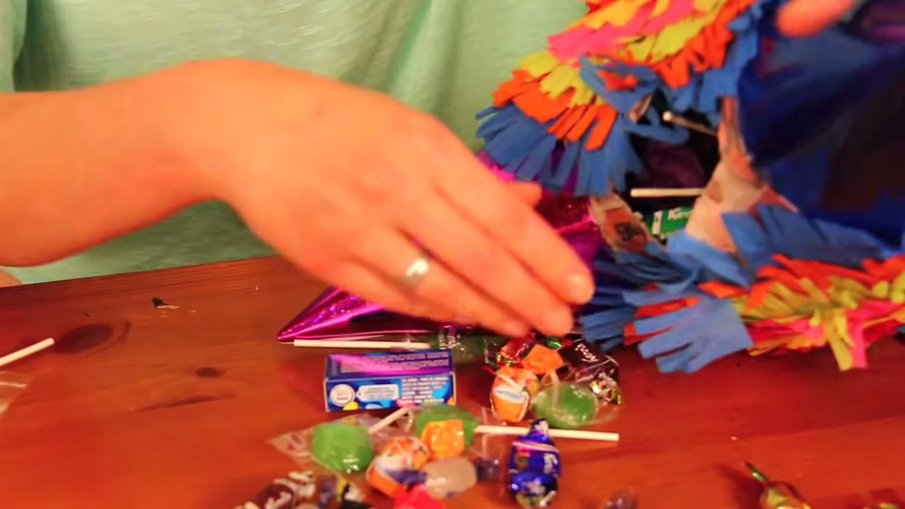 Step 10: Fill It and Seal It Up - How to Make a Pinata