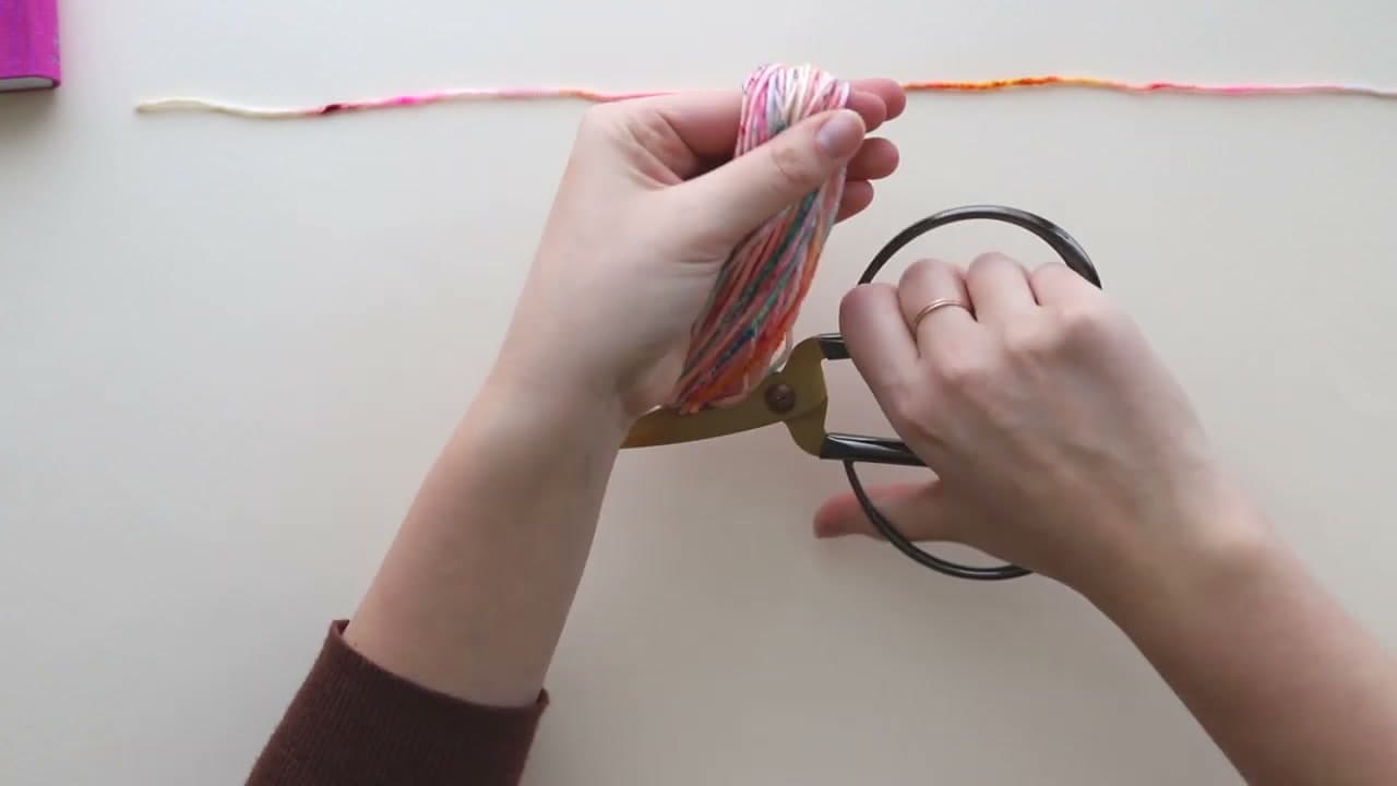 Step 2: Cut Across the Bottom of the Loop With Sharp Scissors - How to Make a Tassel and Attach It to Any Project