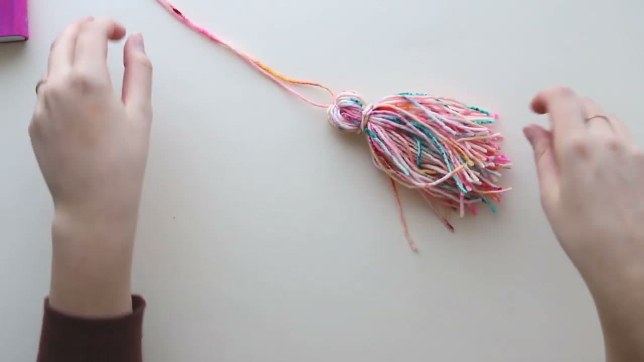 Step 5: Wind the Tie Tails Around the Neck to Make a Collar - How to Make a Tassel and Attach It to Any Project