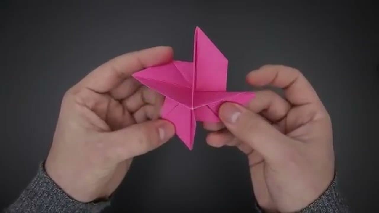 Step 7: Twist the Corners Into Petals