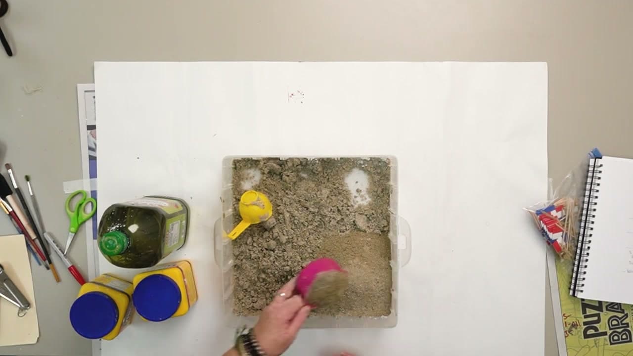 Step 1: Scoop Five Cups of Play Sand into a Bin - How to Make Kinetic Sand