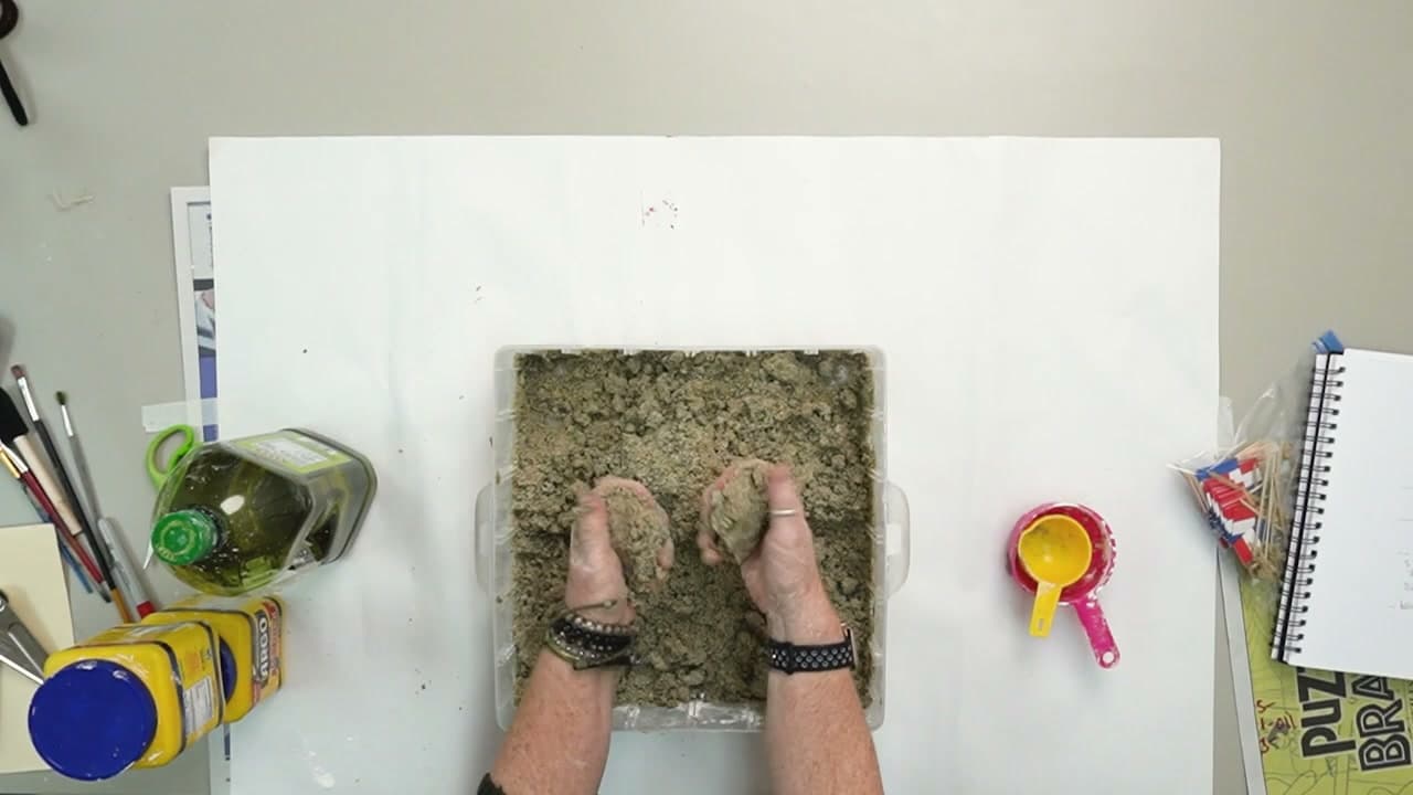 Step 7: Press the Kinetic Sand Flat to Check It Packs - How to Make Kinetic Sand