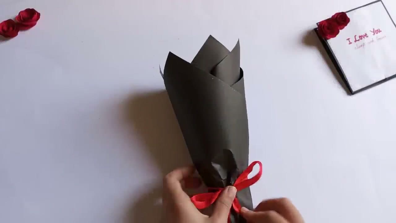 Step 10: Tie a Red Ribbon Around the Base