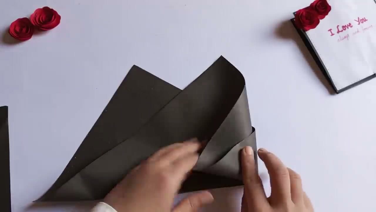 Step 8: Wrap a Second Black Sheet Around the Cone - How to Make a Paper Bouquet (Rose Arrangement)