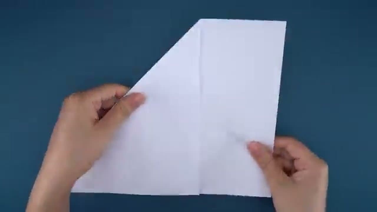 Step 2: Fold the Square in Half Diagonally