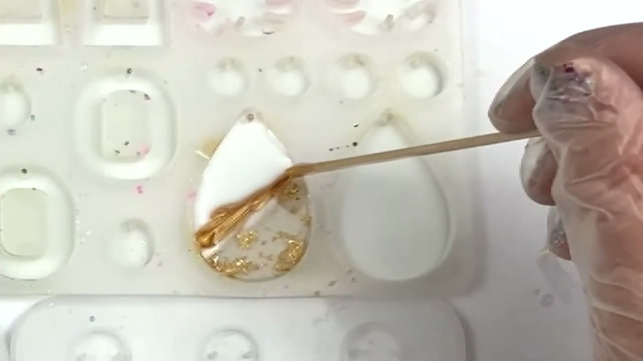 Step 8: Drop the Gold Accent Line and Pop Bubbles - How to Make Resin Earrings: Beginner DIY in 9 Easy Steps